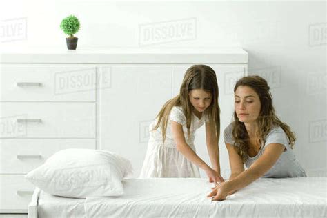 mother daughter making love|Mother and Daughter Making a Bed Together .